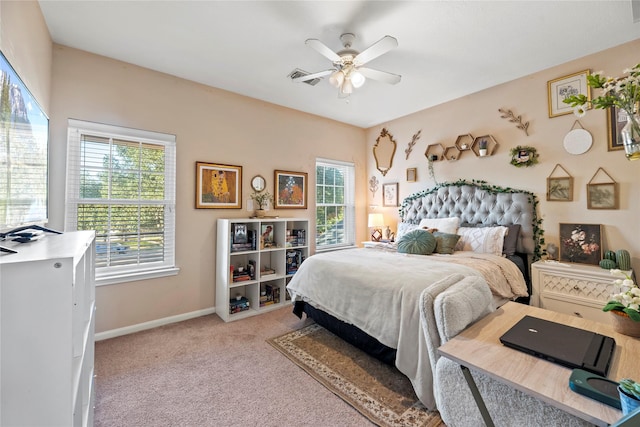 16507 Cypress Brook Ct, Cypress, TX 77429 - bedroom with light carpet, baseboards, and ceiling fan