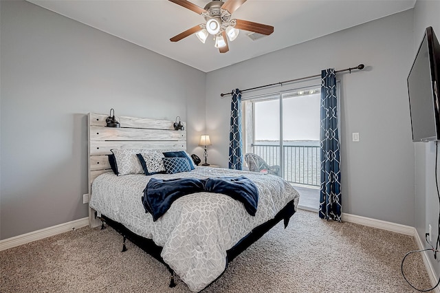 bedroom featuring access to exterior, ceiling fan, and carpet