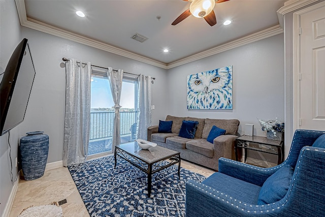 tiled living room featuring ceiling fan and crown molding