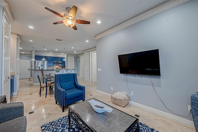 living room featuring ceiling fan and crown molding