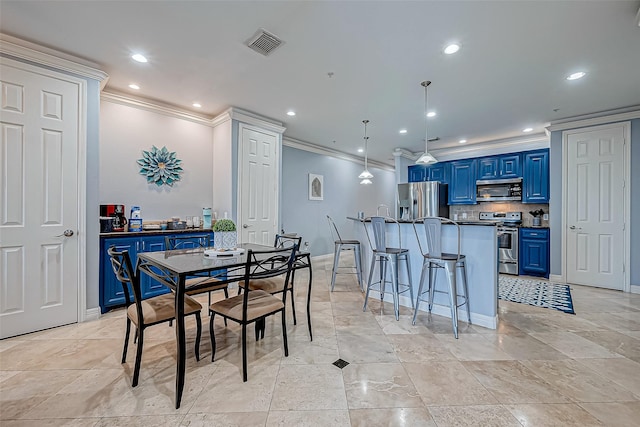 dining room featuring crown molding