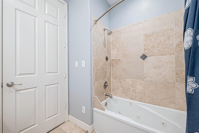 bathroom featuring tile patterned flooring and shower / bath combination with curtain