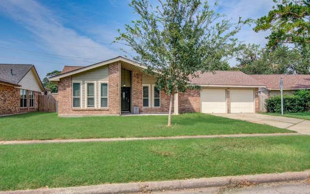 single story home featuring a front yard and a garage