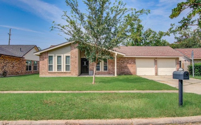 ranch-style home with a garage and a front lawn