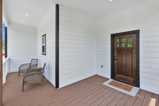 property entrance featuring covered porch