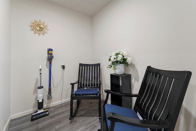 living area featuring hardwood / wood-style flooring