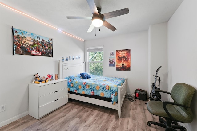 bedroom featuring light wood-type flooring and ceiling fan