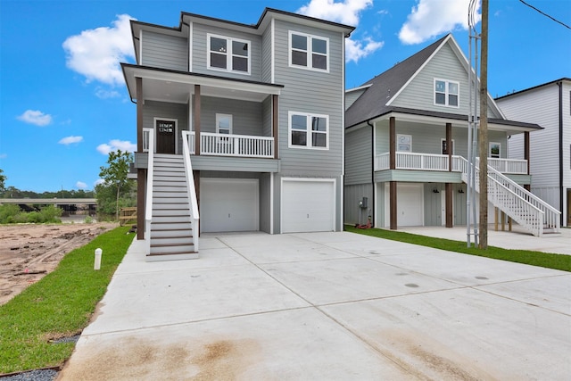 view of front of house featuring a porch and a garage