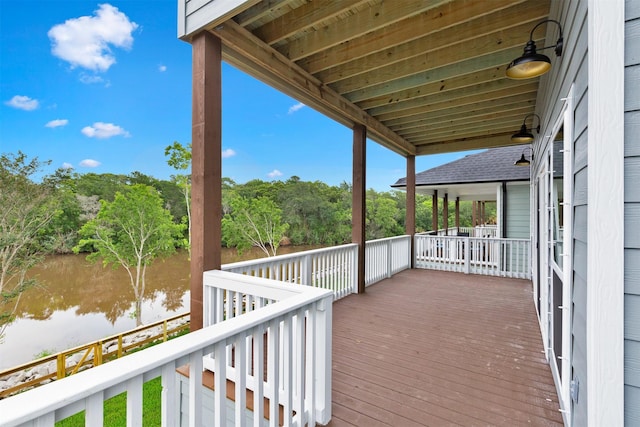 deck featuring a water view