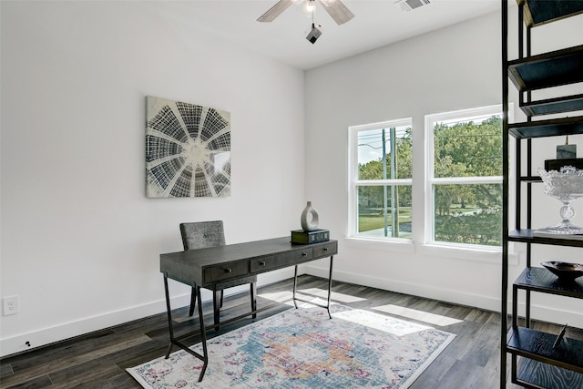 office space with ceiling fan and dark wood-type flooring