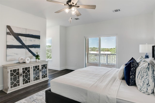 bedroom featuring ceiling fan, dark wood-type flooring, and access to outside