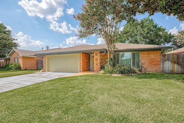 ranch-style house with a garage and a front lawn