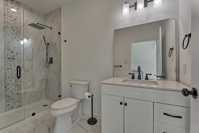 bathroom with an enclosed shower, vanity, and toilet