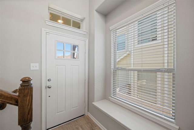 entryway with light hardwood / wood-style flooring