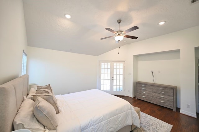 bedroom featuring ceiling fan, french doors, dark wood-type flooring, a textured ceiling, and lofted ceiling