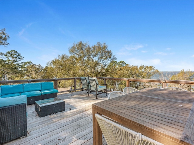 wooden deck featuring an outdoor hangout area