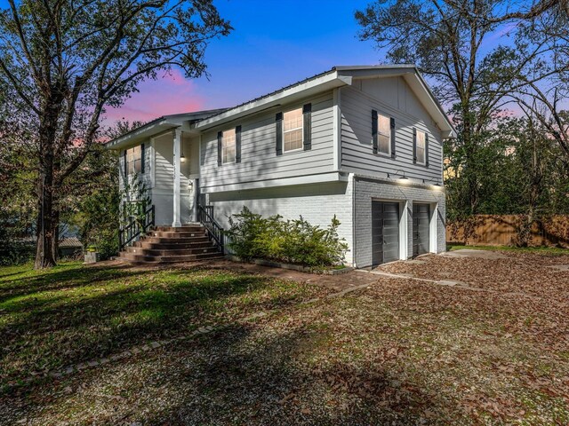 view of front of property featuring a garage