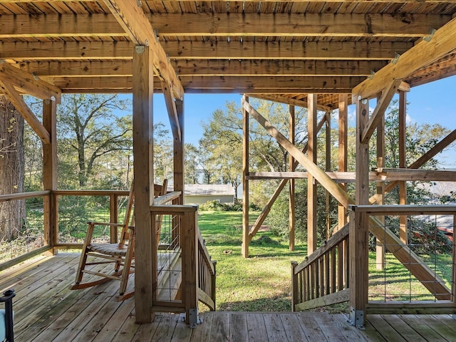 wooden deck with a yard