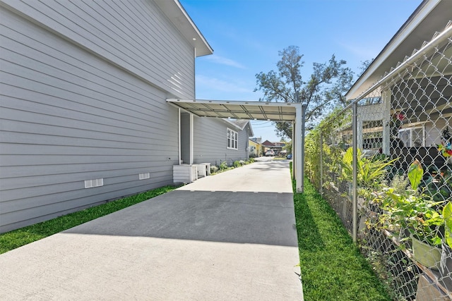 view of patio / terrace with a carport