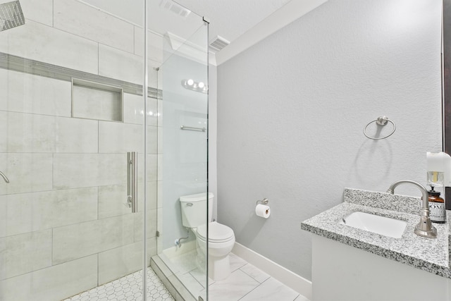 bathroom featuring vanity, an enclosed shower, and toilet