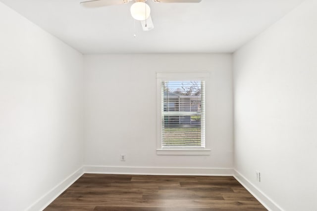 unfurnished room featuring ceiling fan and dark hardwood / wood-style flooring