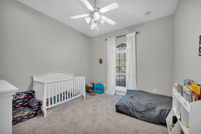 bedroom with light colored carpet and ceiling fan