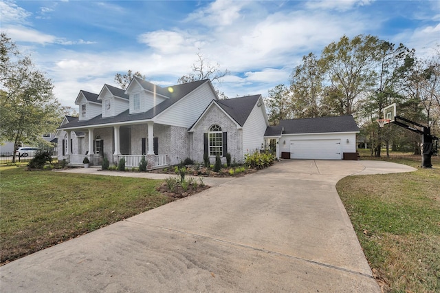 cape cod home with a garage, a front yard, and covered porch