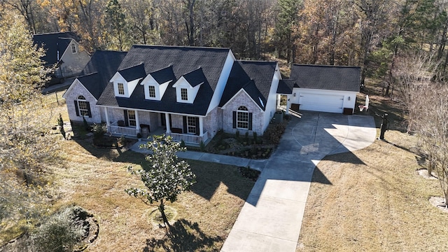 view of front of home with a garage and covered porch