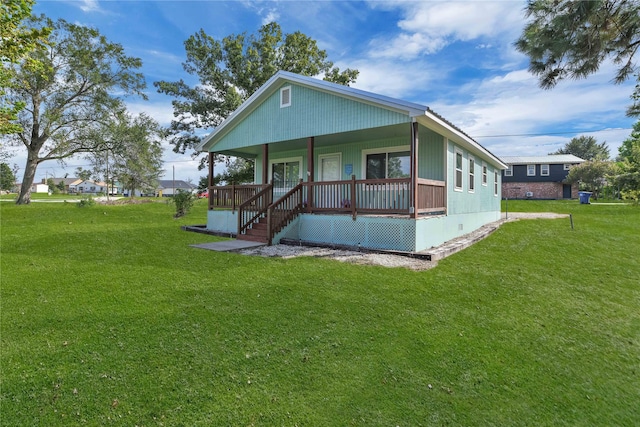 view of front of home featuring a porch and a front yard