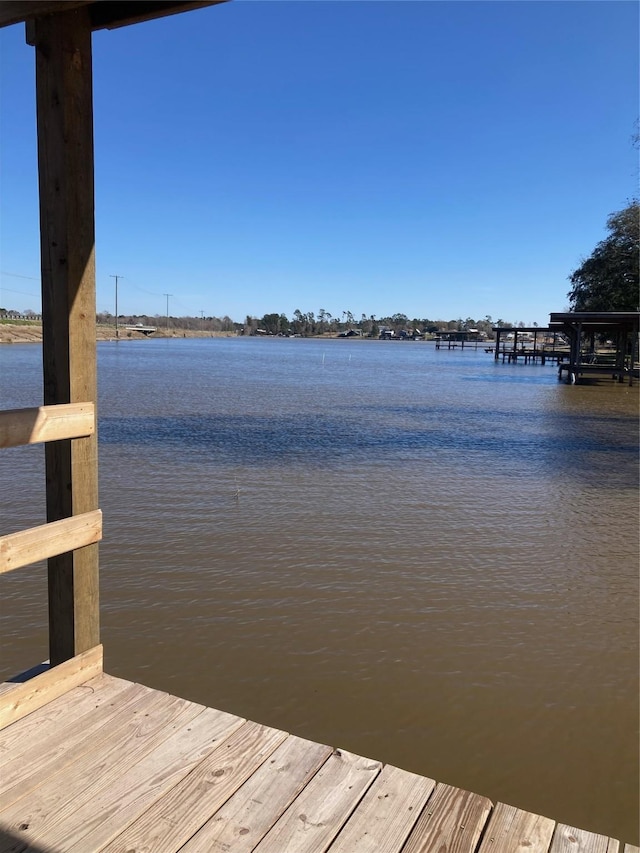 view of dock with a water view