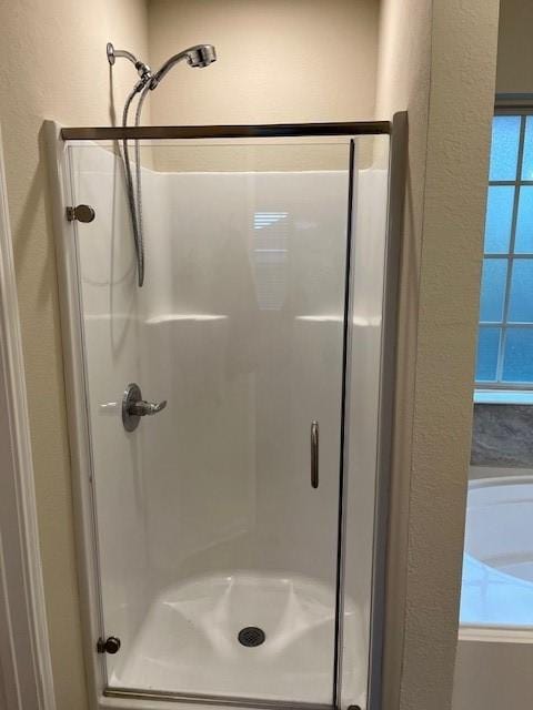 bathroom featuring a stall shower