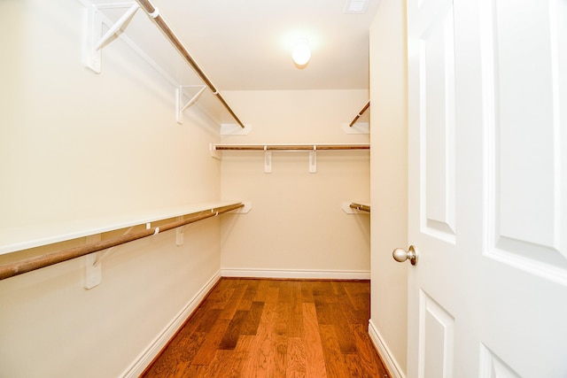 walk in closet featuring wood-type flooring