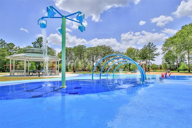 exterior space featuring a gazebo and a playground