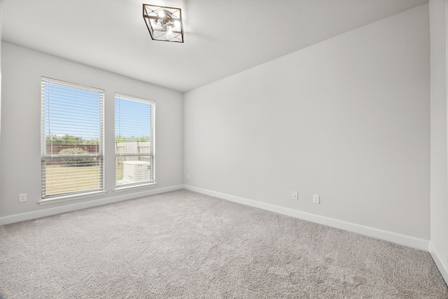 empty room featuring carpet floors