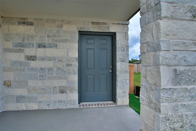 2971 Colonia Blossom Ln, Pinehurst, TX 77362 - view of exterior entry featuring stone siding
