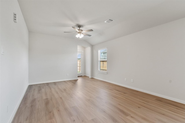 2971 Colonia Blossom Ln, Pinehurst, TX 77362 - empty room featuring ceiling fan, light wood-style floors, baseboards, and lofted ceiling