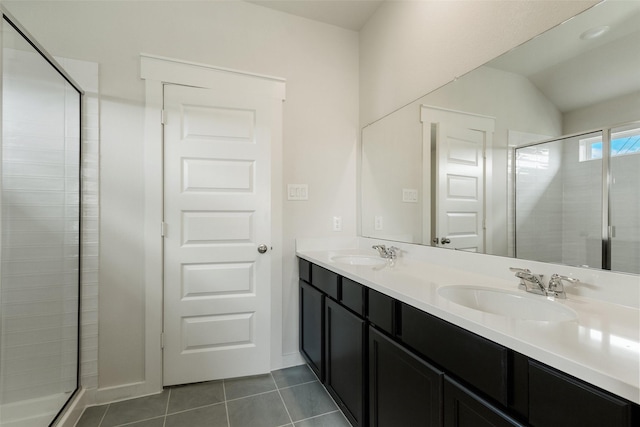 2971 Colonia Blossom Ln, Pinehurst, TX 77362 - full bathroom with a stall shower, tile patterned floors, double vanity, and lofted ceiling