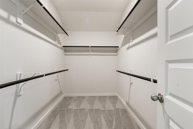 2971 Colonia Blossom Ln, Pinehurst, TX 77362 - spacious closet featuring light carpet