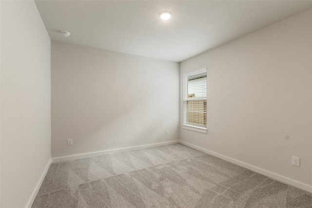 2971 Colonia Blossom Ln, Pinehurst, TX 77362 - carpeted empty room with baseboards
