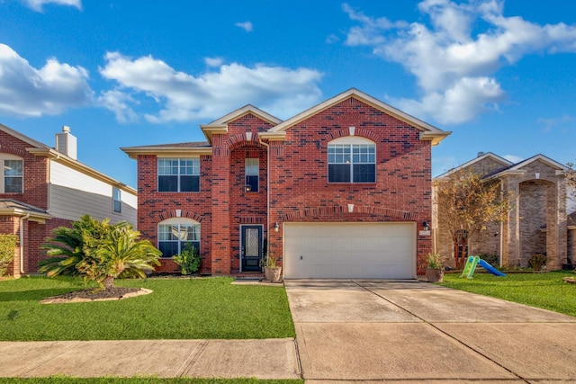 view of front of home with a garage and a front lawn