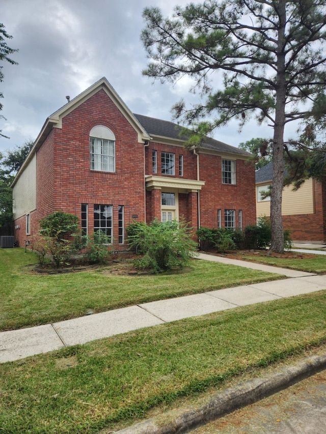 view of front of home with a front lawn