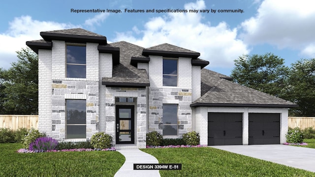 view of front of property with a front yard and a garage