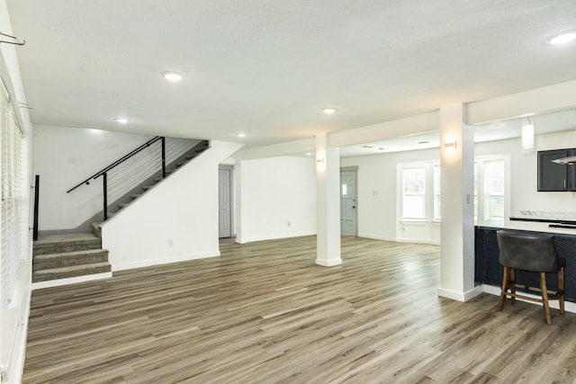 living room featuring dark wood-type flooring