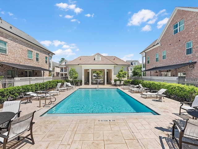 view of pool featuring a patio area