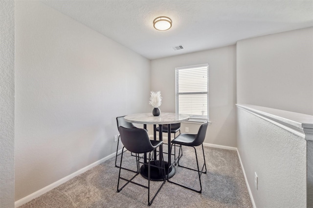 view of carpeted dining room