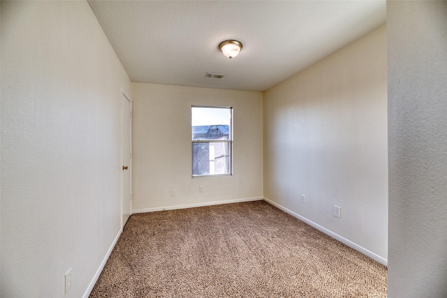 unfurnished room with carpet