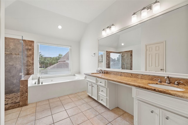 bathroom with vanity, tile patterned flooring, plus walk in shower, and vaulted ceiling