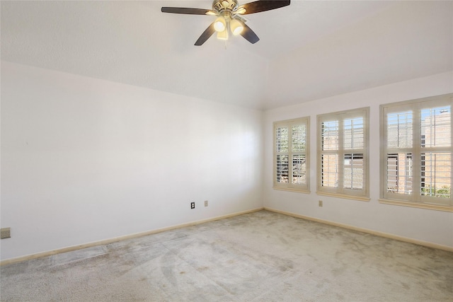 unfurnished room featuring ceiling fan and carpet floors