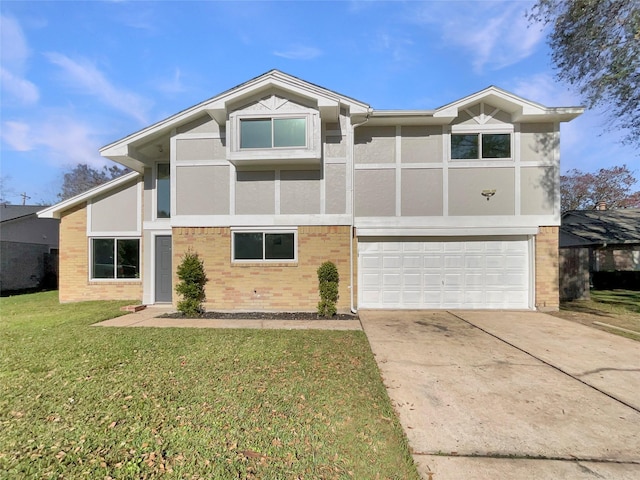 view of front of property with a garage and a front lawn