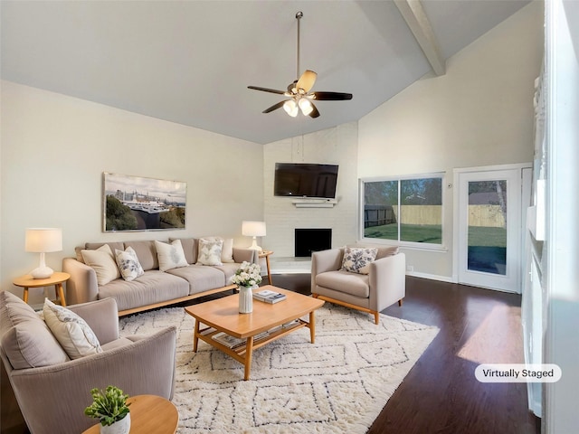 living room with beam ceiling, ceiling fan, dark wood-type flooring, high vaulted ceiling, and a fireplace